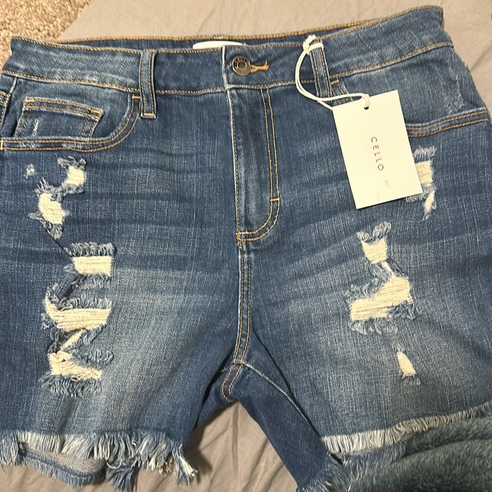 Distressed Blue Jeans NWT upstairs as